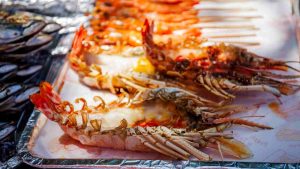 La ricetta degli scampi al forno